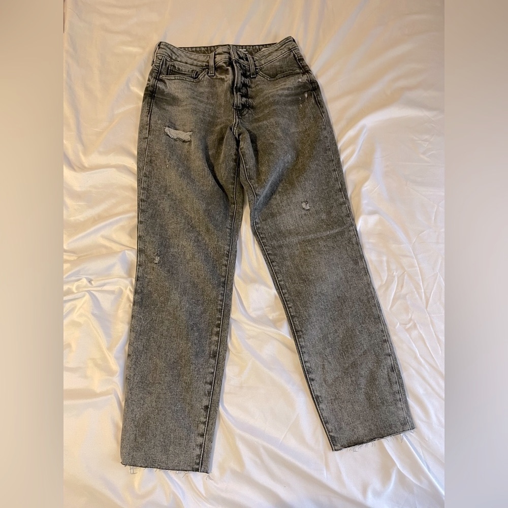 Grey wash, ripped, raw hem old navy jeans.